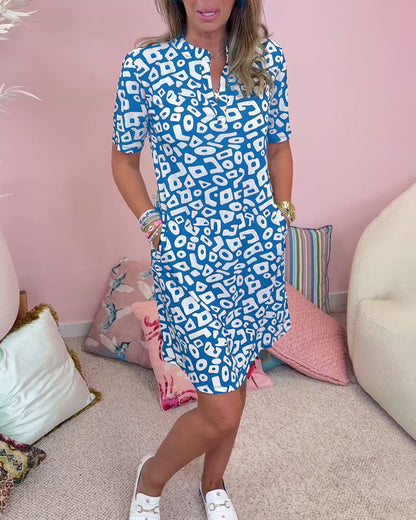 Viaro | Printed Dress with V-Neck and Pockets