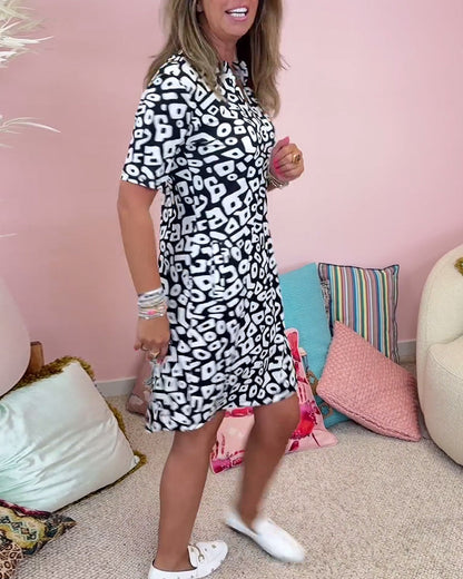 Viaro | Printed Dress with V-Neck and Pockets