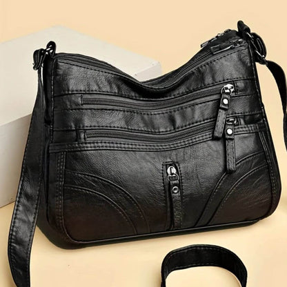 Cheryl’s Sleek Zip Companion | Crossbody Bag