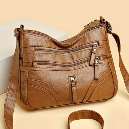 Cheryl’s Sleek Zip Companion | Crossbody Bag