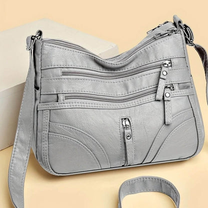 Cheryl’s Sleek Zip Companion | Crossbody Bag